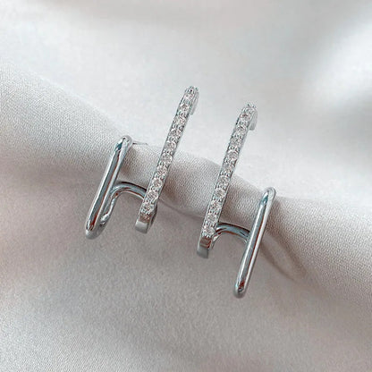 The Ada Irregular Claw Earrings